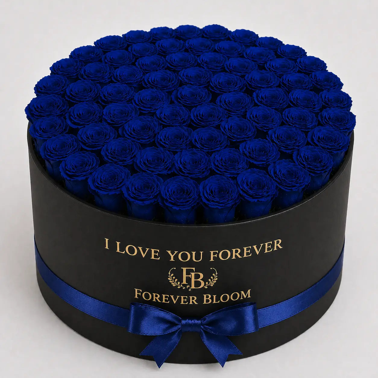 Black box filled with blue roses and 'I Love You Forever' message, featuring Forever Bloom branding.