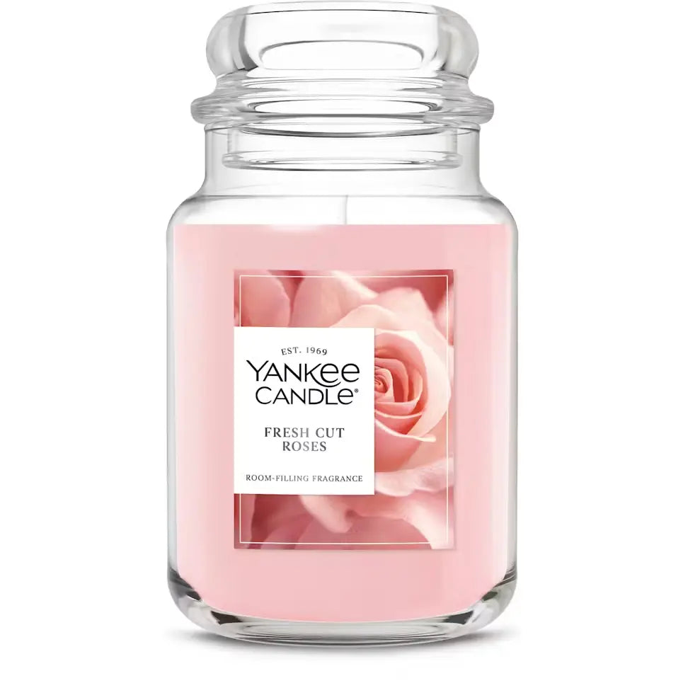 Yankee Candle jar candle with pink rose design on a white background