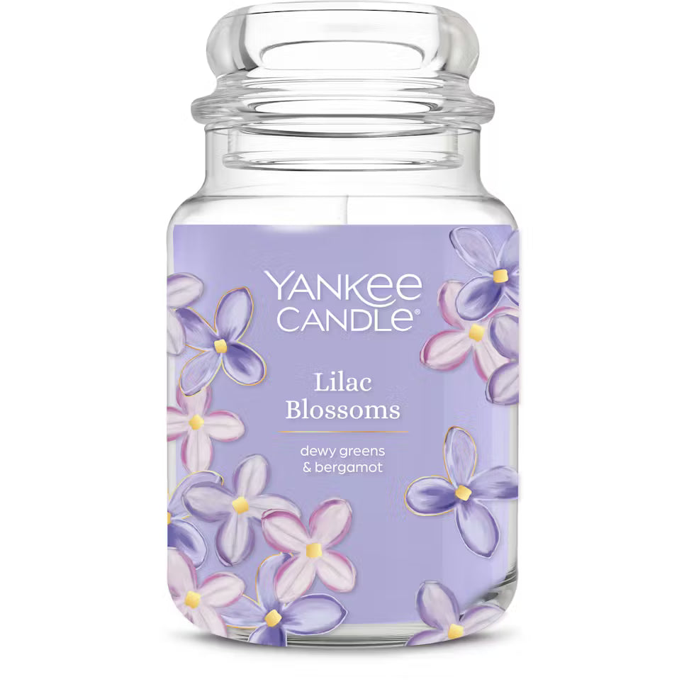 Yankee Candle Lilac Blossoms candle jar with floral design on a white background