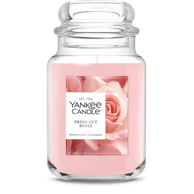 Yankee Candle jar candle with pink rose design on a white background